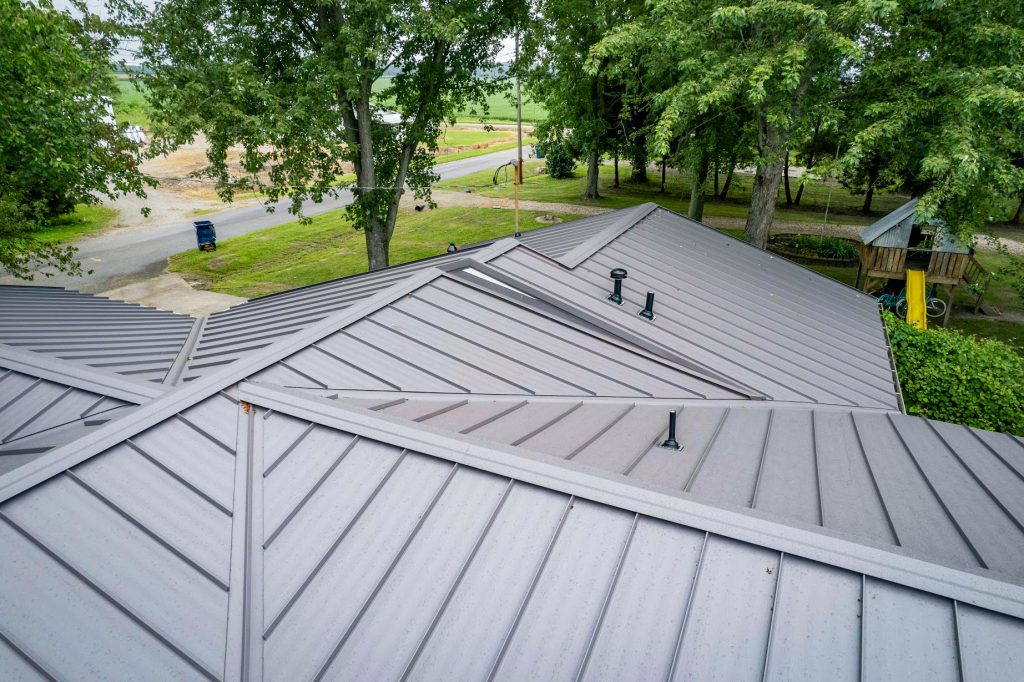 A standing seam roof made of metal panels, emphasizing a robust and stylish roofing solution for buildings.