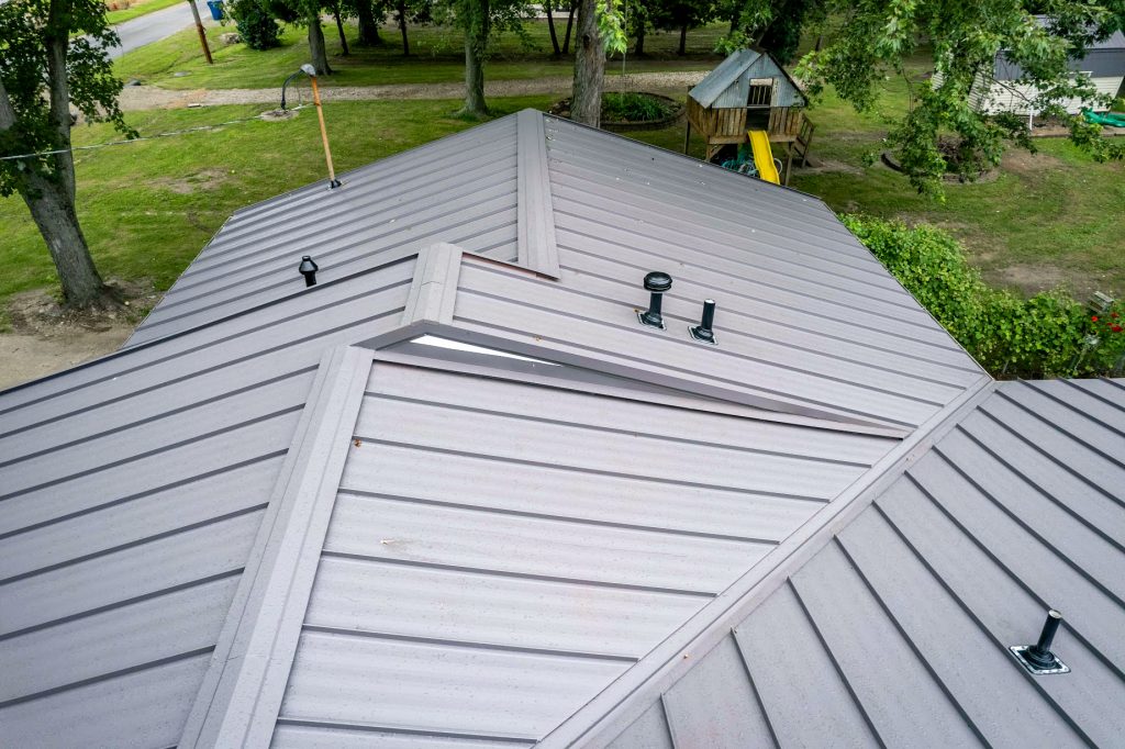 A standing seam roof made of metal panels, highlighting its contemporary style and robust construction.