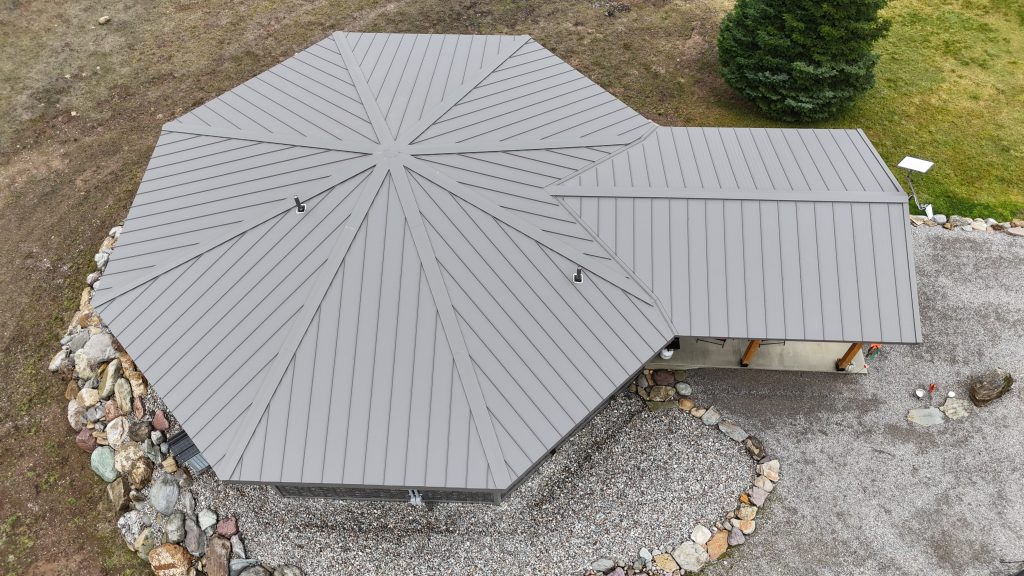 Unique octagonal metal roof in Charcoal Crinkle finish with radial standing seam pattern