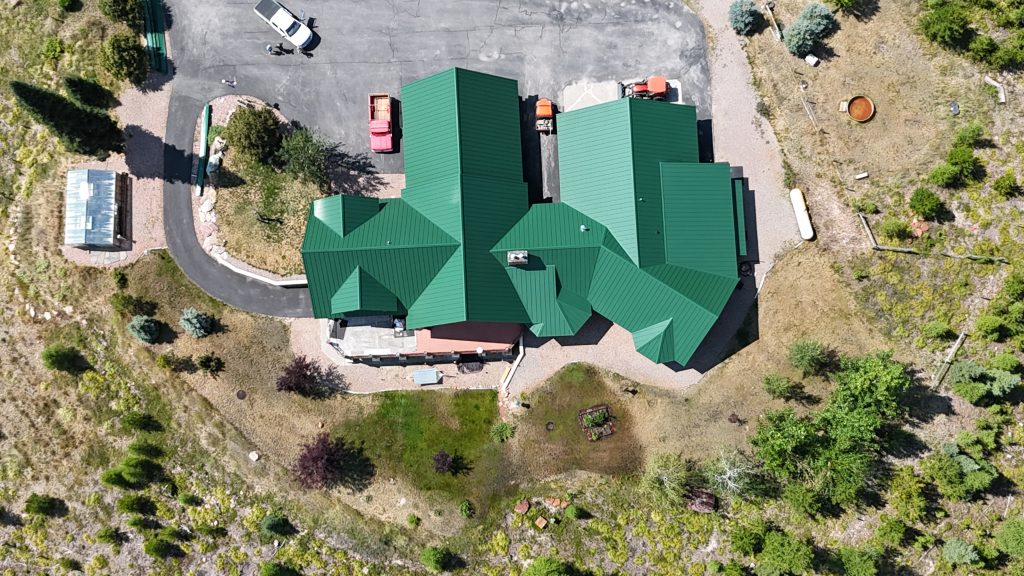 Green Metal Roof - Complex Multi-Level Roofline